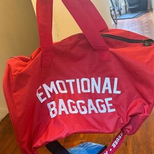 Red Duffel Bag with White Text